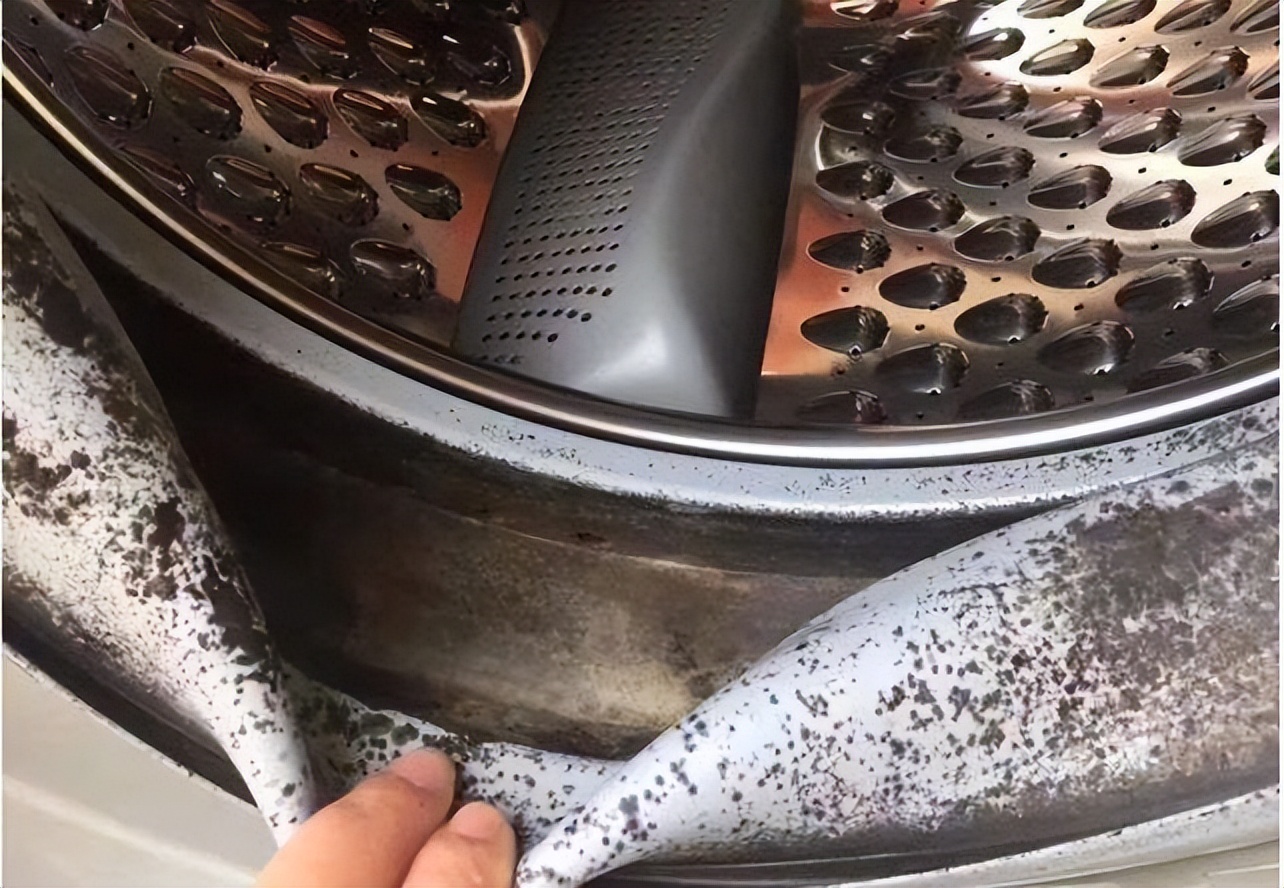 洗衣机清洗后衣服上有渣子怎么办,洗衣机洗的衣服很多毛絮怎么清理