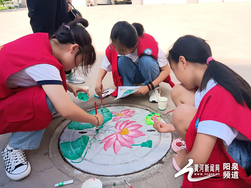 “井”上添花画莲话廉