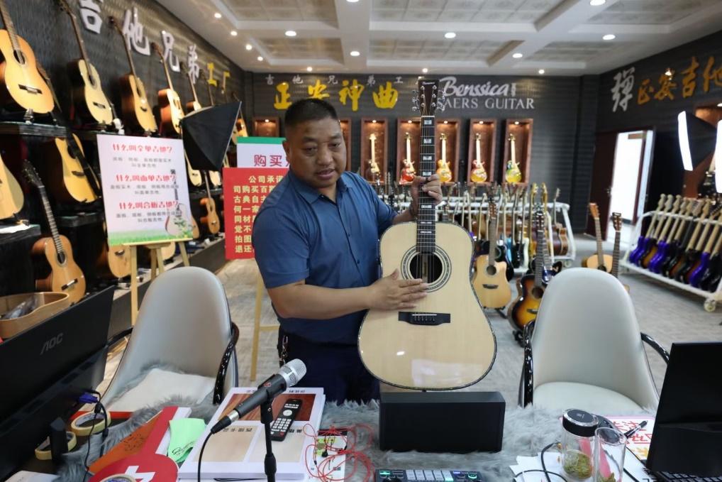 满帮：用数字运力助力贵州正安打造中国吉他制造之乡