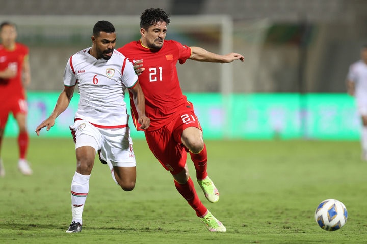 新华社中国足球赢得世界尊重,新华社谈中国足球