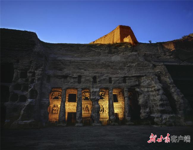 吴健：光影为笔绘敦煌