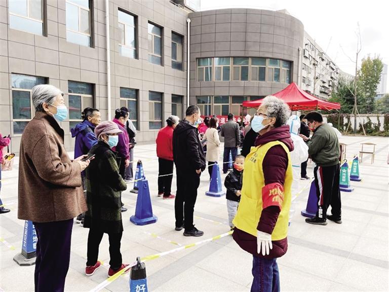 一抹志愿红温暖在冰城,一抹志愿红温暖战疫路