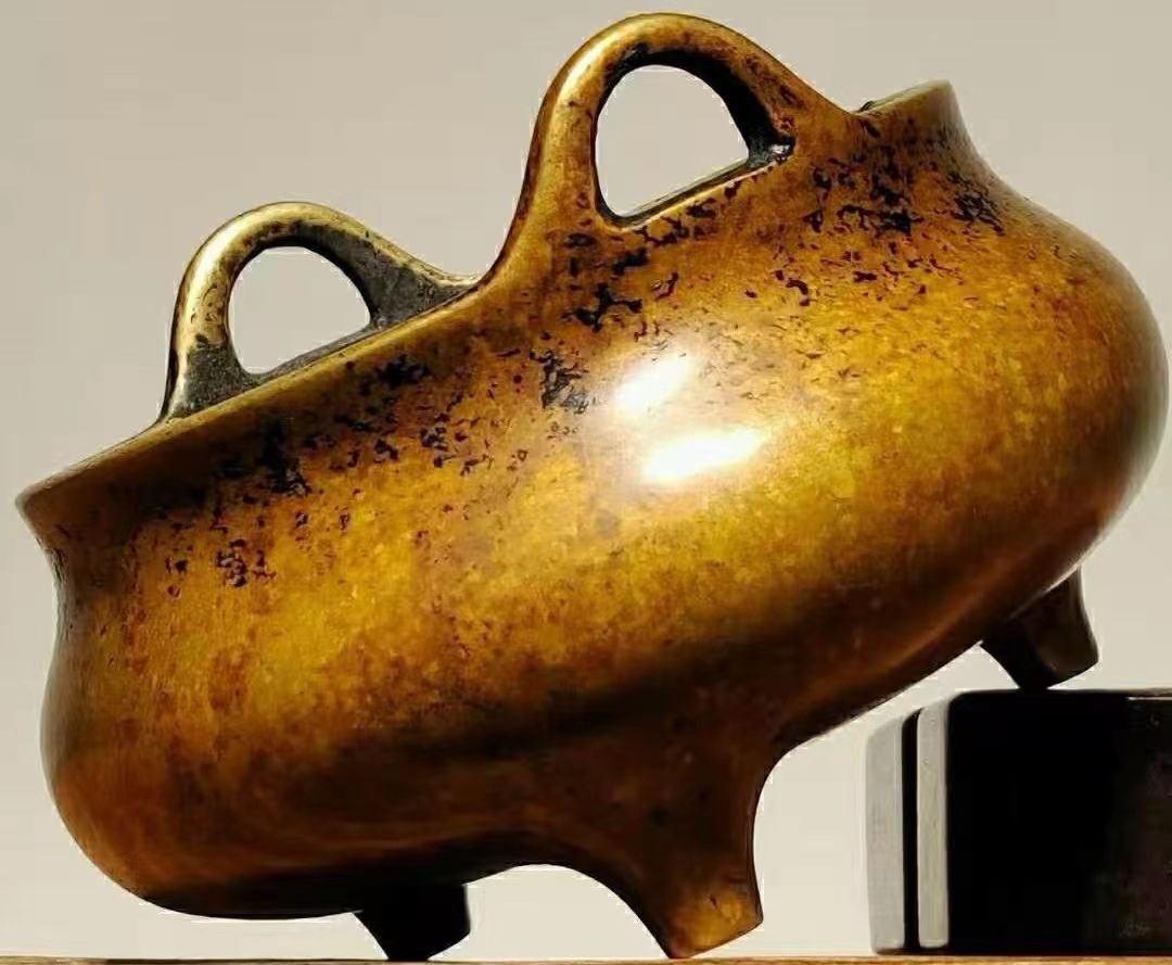 宣德炉黑漆古皮形成原因,珠光宝色的宣德炉