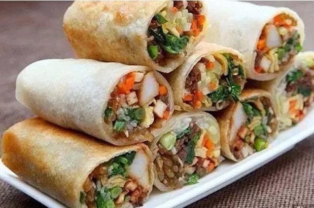 特色年夜饭畅销餐桌上的年味浓,一桌年夜饭成为游子们家的味道